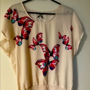 Sleeveless butterfly print top